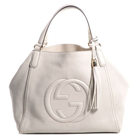 gucci white outdit|white Gucci handbag.